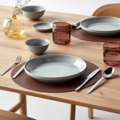 Dot Pecan Round Leather Placemat -Furniture Store profilerimgray summer2022catalog gallery2 1