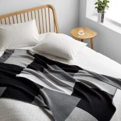 Sonia Graphite Knit Throw Blanket -Furniture Store unison 10 23 6844