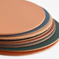 Dot Deep Teal Round Leather Coasters Set Of 4 -Furniture Store vacavaliente dot coasters group mix 2 1 1